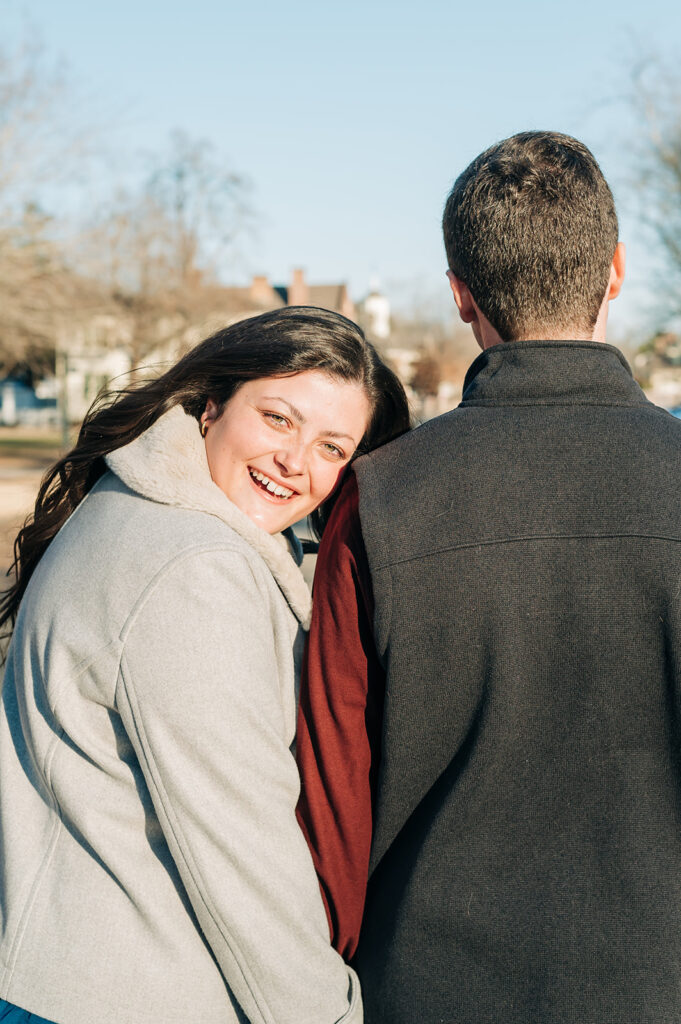 girl laughing and looking back