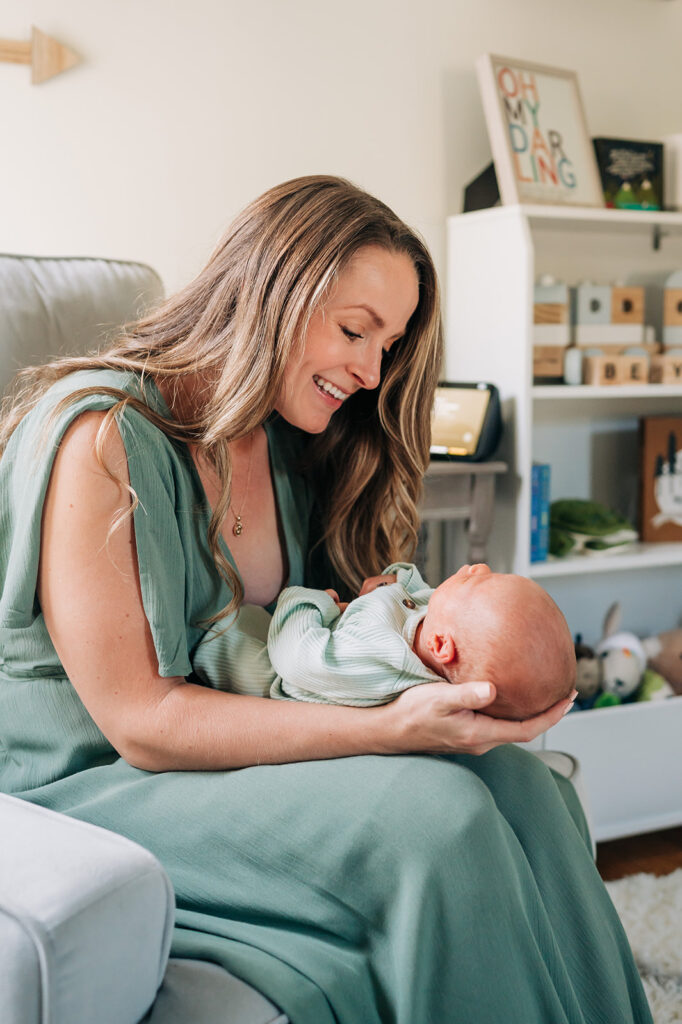 mom smiles at baby