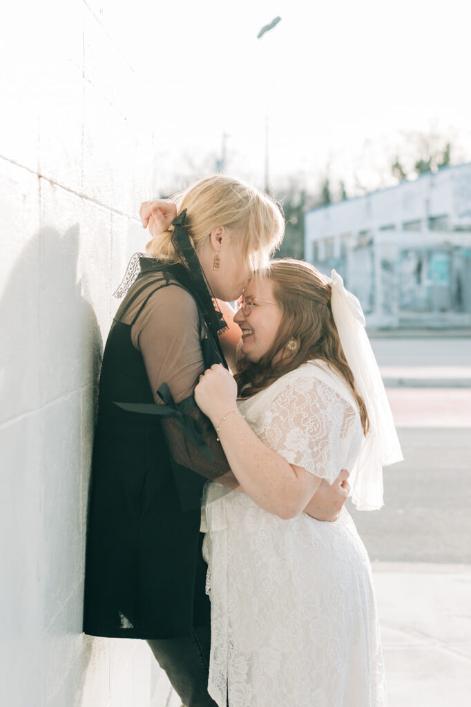 couple kissing forehead