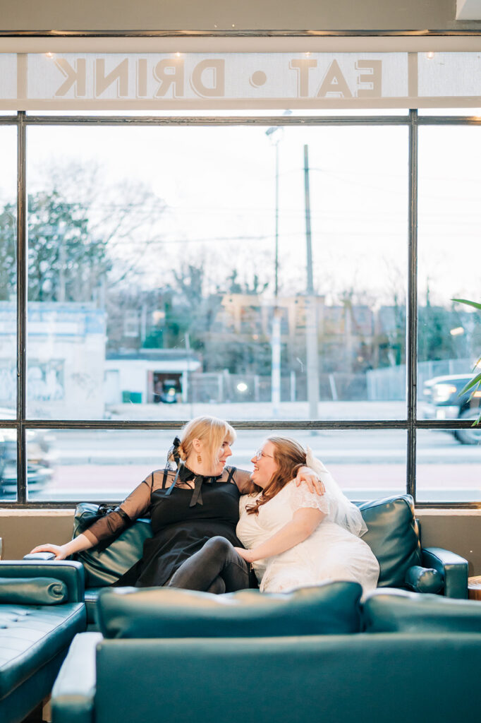 couple gazing on couch