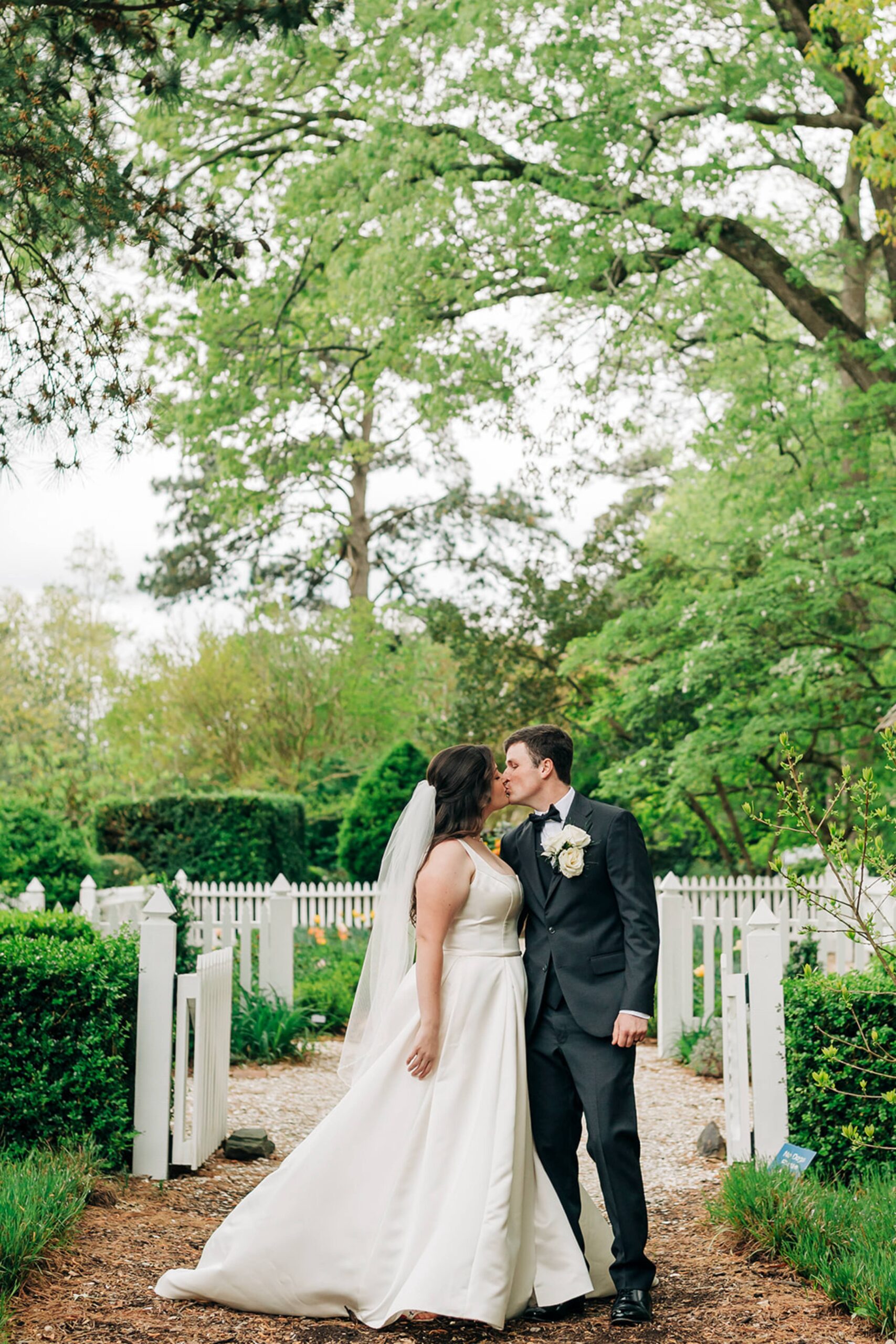 couple kisses after their wedding