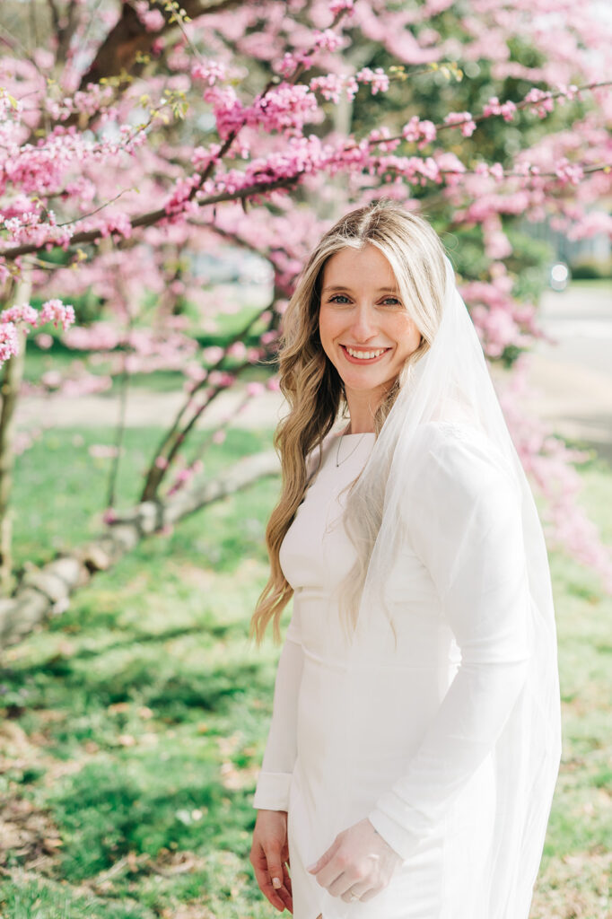 bride laughing infant of tree
