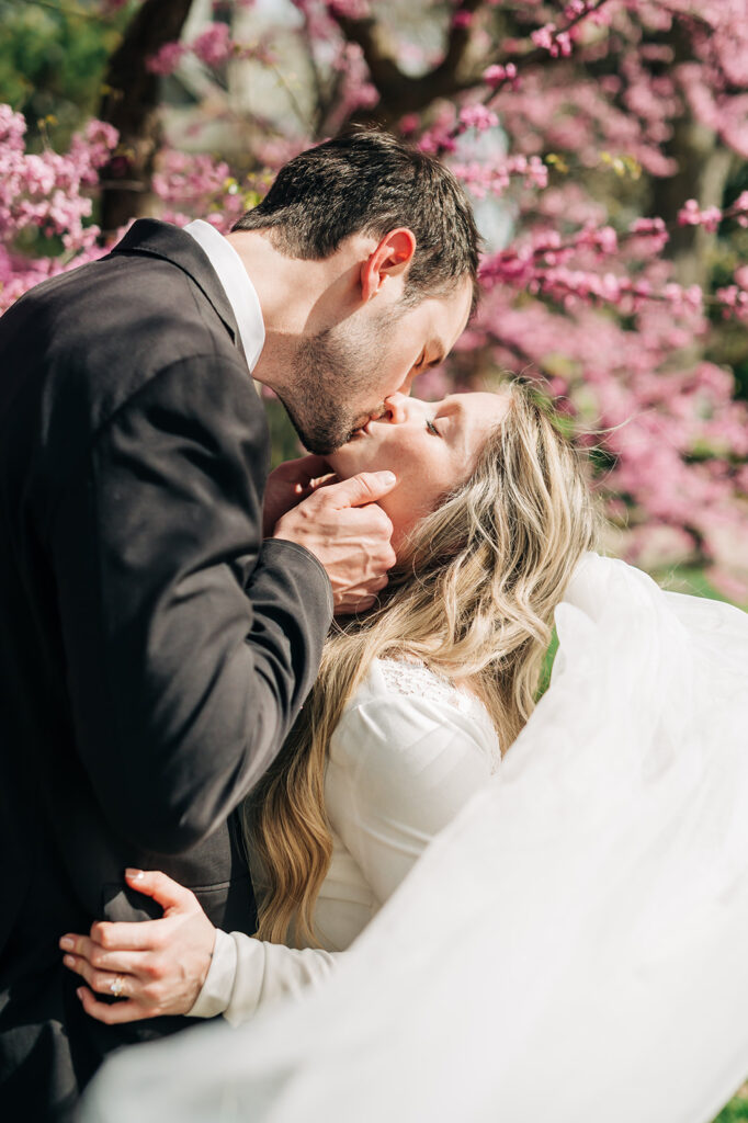 veil blows behind bride