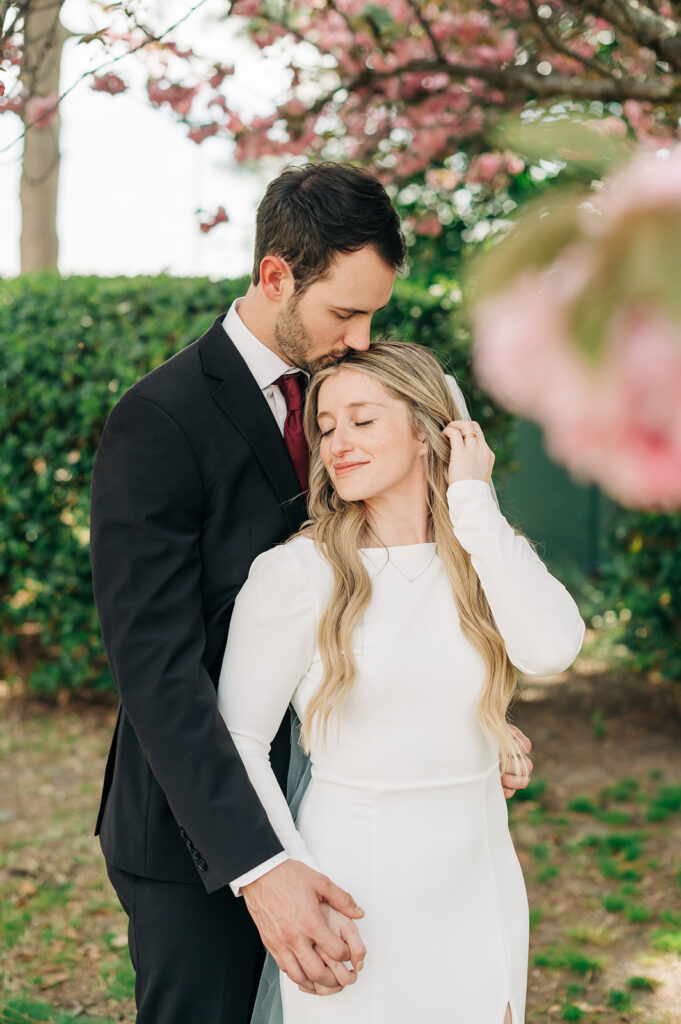 groom kissing bride