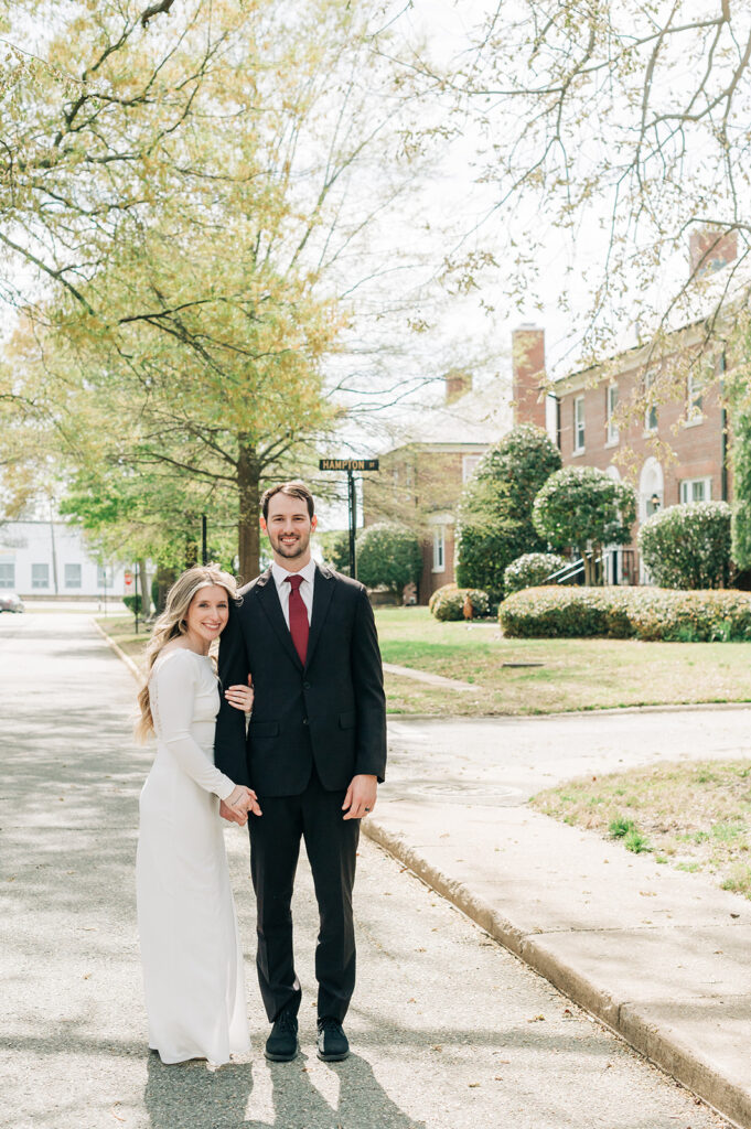couple embraces on street