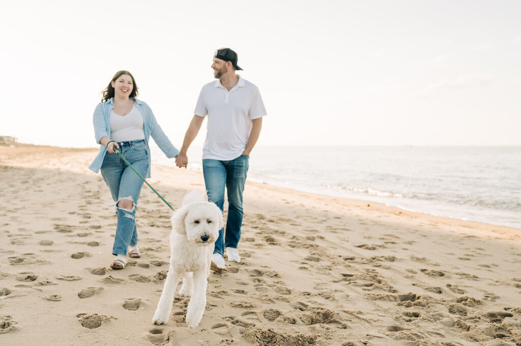 couple walks with dog