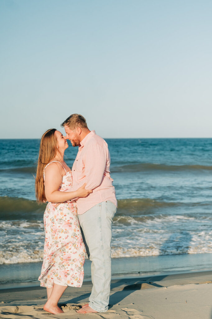 couple touch nose after proposal