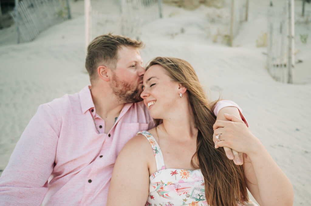 man kisses fiance cheek