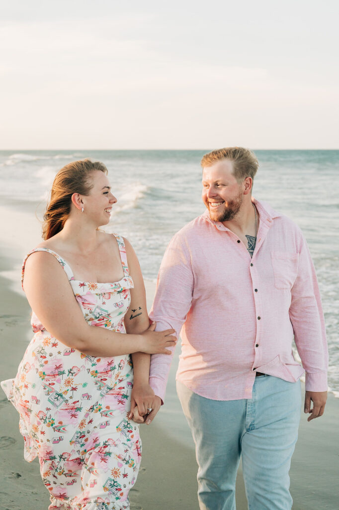 couple smiles and laughs