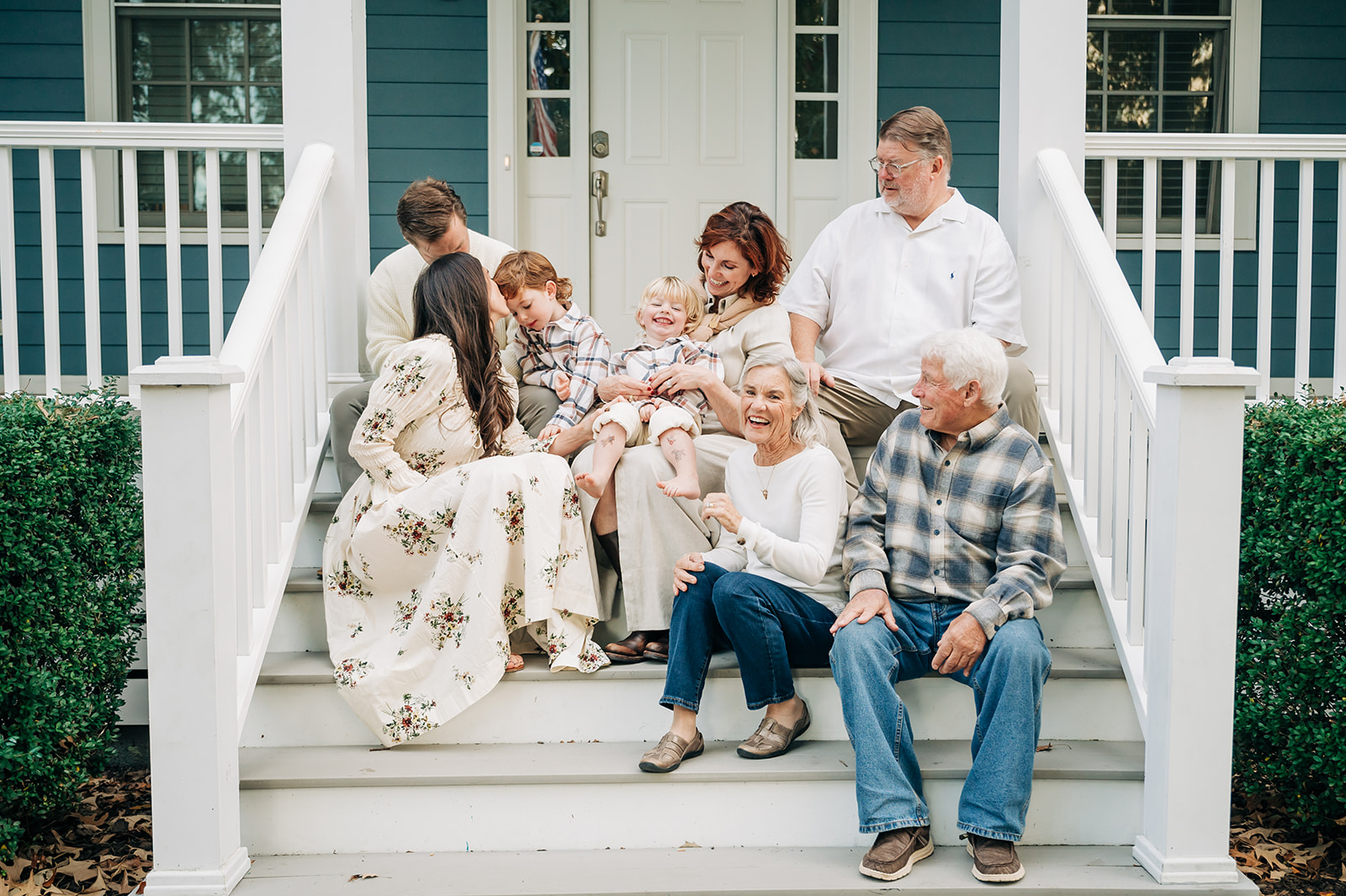 extended family on porch laughing