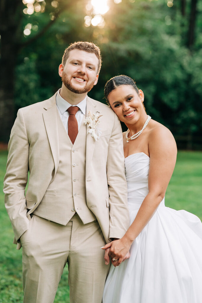 bride cuddling groom