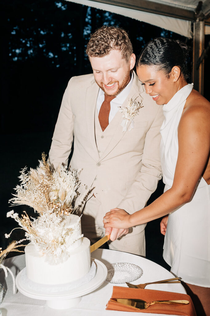 couple cutting cake