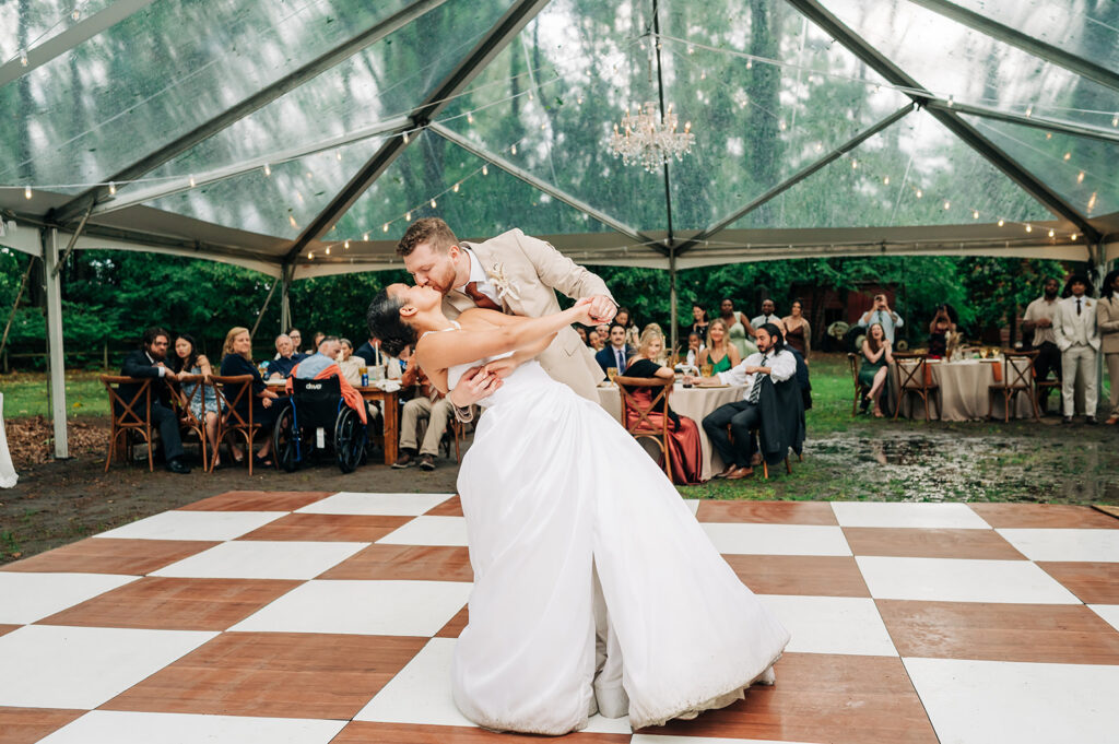 Couple kissing under tent