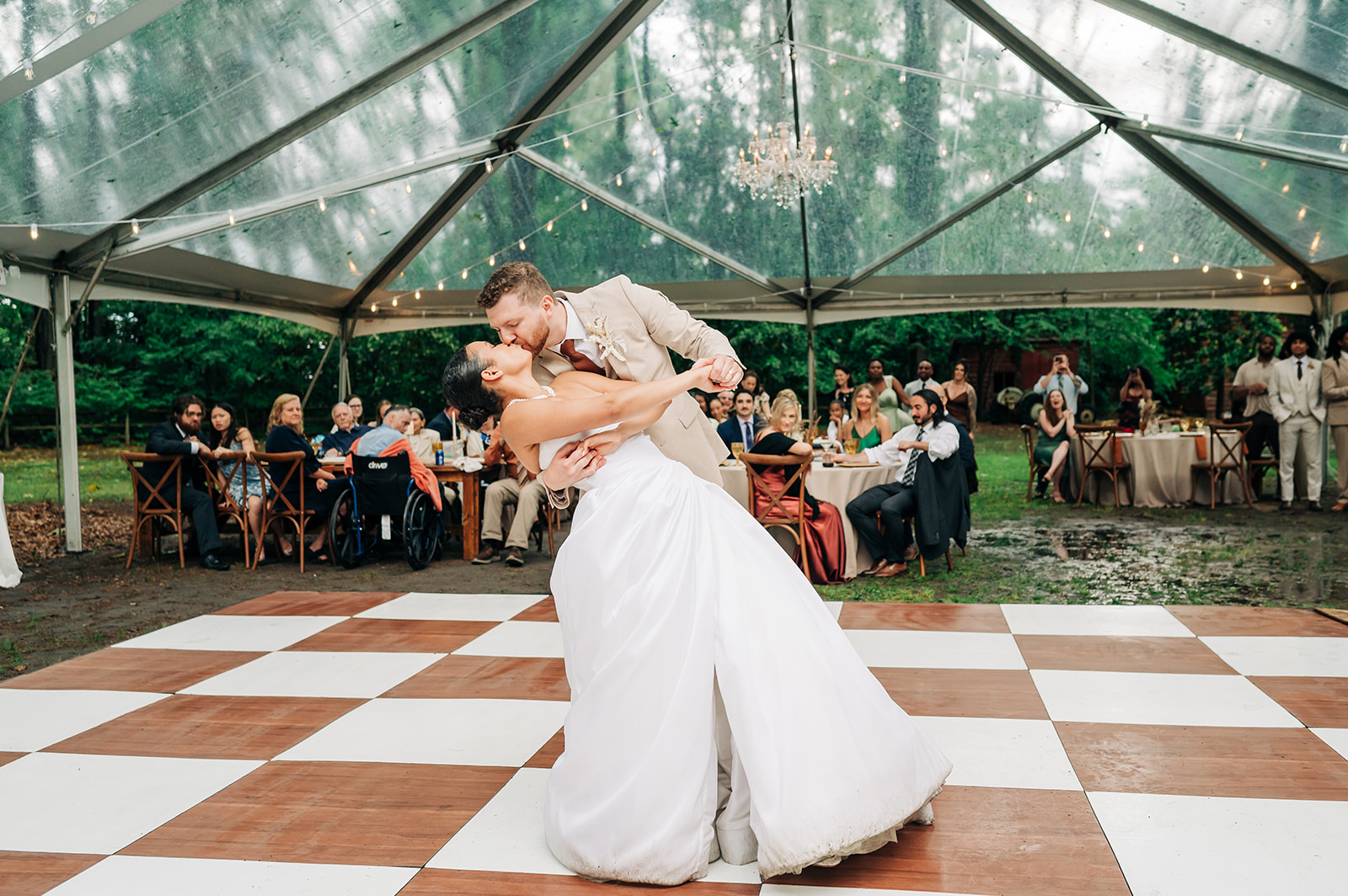 Couple kissing under tent
