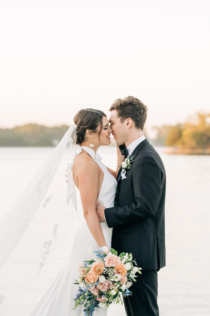 couple kissing after wedding