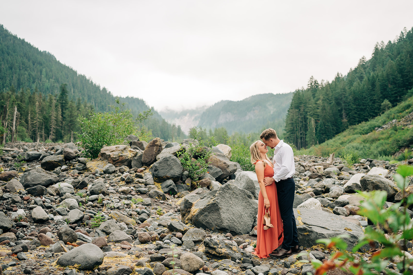 couple having engagement photos at Mt Rainer PARK