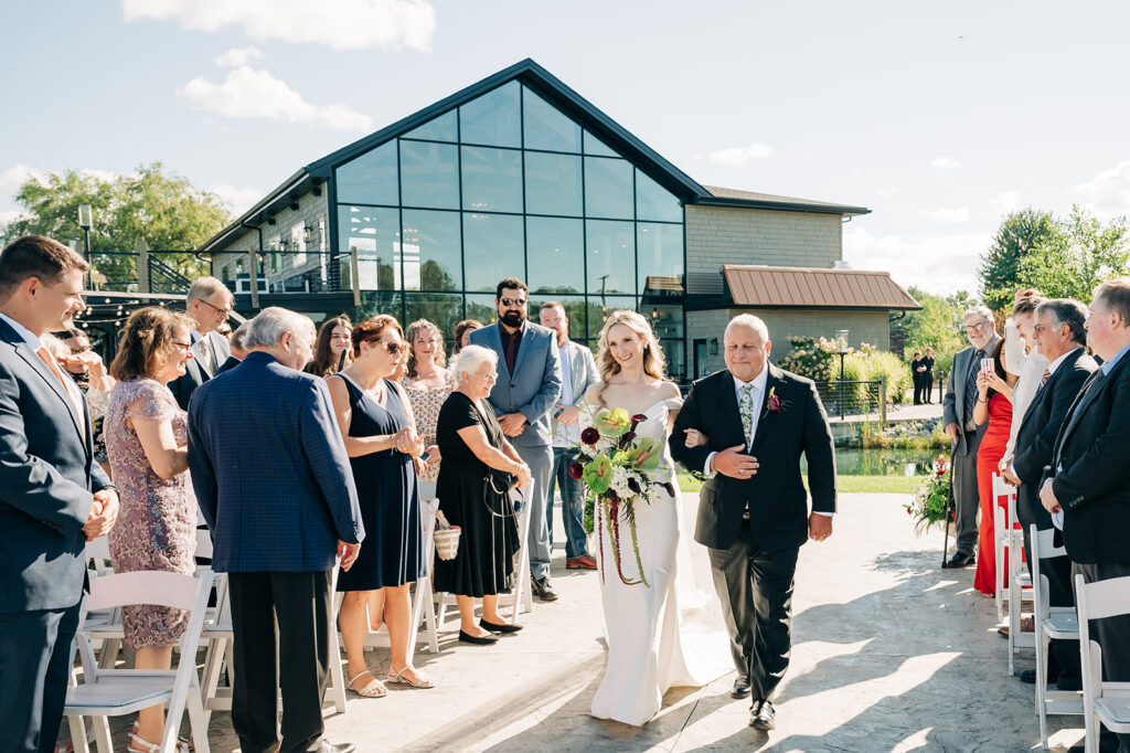 Bride walking down aisle at The Sterling at Arrowhead venue in buffalo NY